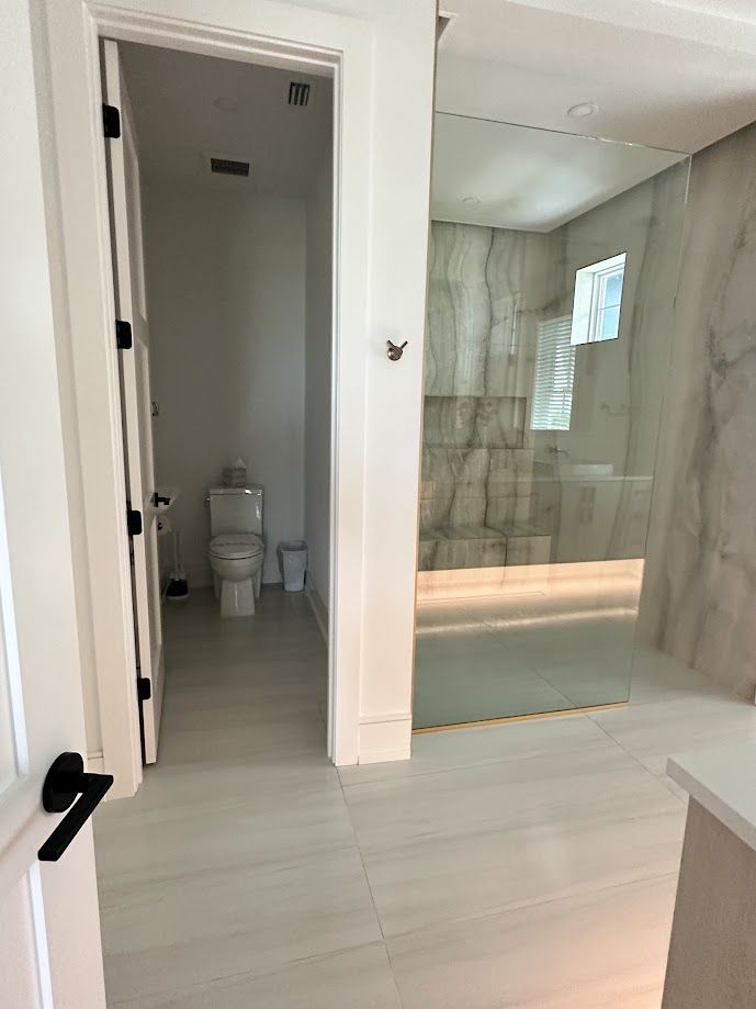 Bathroom with glass walk-in shower, streak-free